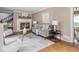 Cozy living room featuring a fireplace, modern decor, and plenty of natural light at 1207 Pickwick Pl, Indianapolis, IN 46208