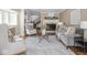 Inviting living room with a fireplace, neutral color palette, and stylish furniture at 1207 Pickwick Pl, Indianapolis, IN 46208