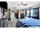 Bedroom featuring carpet floors, closet, ceiling fan, and natural lighting at 121 Ursal Ln, Greenwood, IN 46143
