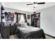 Cozy bedroom featuring a comfortable bed, closet, and a ceiling fan at 121 Ursal Ln, Greenwood, IN 46143