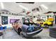 Inside the garage showing race cars and equipment at 121 Ursal Ln, Greenwood, IN 46143