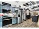 Bright kitchen features stainless steel appliances, and a peninsula island at 121 Ursal Ln, Greenwood, IN 46143