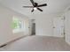 Light-filled bedroom with a walk-in closet and a bright window at 12118 Castle Row Overlook, Carmel, IN 46033