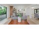 Bright living room with hardwood floors and sliding glass door to a back deck at 12118 Castle Row Overlook, Carmel, IN 46033