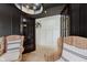 Comfortable office area with decorative ceiling, stylish light fixture, and opening to another room at 12118 Castle Row Overlook, Carmel, IN 46033