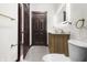 Updated primary bathroom features a new vanity, modern mirror and fixtures, and an adjacent closet at 1217 Newman St, Indianapolis, IN 46201