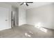 Spacious bedroom featuring neutral carpet, white doors, and ceiling fan at 1217 Newman St, Indianapolis, IN 46201