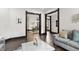 Spacious living room with views into the dining room at 1217 Newman St, Indianapolis, IN 46201