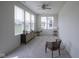 Bright living space with large windows offering views of the outdoors, modern furnishings, and great natural light at 13448 Mosaic St, Fishers, IN 46037