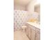 Bathroom featuring light gray cabinets, white countertop, and patterned shower curtain at 13820 Woodside Hollow Dr, Carmel, IN 46032