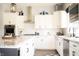 Modern kitchen design with white cabinetry, stainless steel appliances, and a subway tile backsplash at 13820 Woodside Hollow Dr, Carmel, IN 46032