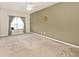Bedroom features window seat and neutral walls at 15308 Wolf Run Ct, Noblesville, IN 46060