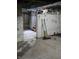 Unfinished basement with concrete floors and exposed ceiling at 1601 S Biltmore Ave, Muncie, IN 47302