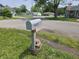 Curb side mailbox view of houses across the intersection at 1601 S Biltmore Ave, Muncie, IN 47302