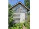 Backyard shed with weathered wood exterior at 1601 S Biltmore Ave, Muncie, IN 47302