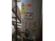 Water heater with energy guide and warning labels at 1601 S Biltmore Ave, Muncie, IN 47302