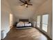 Spacious bedroom with unique ceiling design, creating a tranquil space with a private balcony at 1720 Rembrandt St, Indianapolis, IN 46202