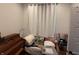 Bright bedroom with ample natural light and a neutral color palette, creating a serene and inviting atmosphere at 1720 Rembrandt St, Indianapolis, IN 46202