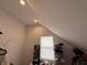 Attic bedroom with closet and shelving at 1720 Rembrandt St, Indianapolis, IN 46202