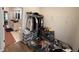 Walk-in closet featuring hanging racks, shelving, and convenient access to the luxurious ensuite bathroom at 1720 Rembrandt St, Indianapolis, IN 46202