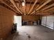 Spacious garage with ample storage space and an overhead door, offering convenience and functionality at 1720 Rembrandt St, Indianapolis, IN 46202
