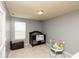 bedroom with a dark crib and a window providing natural light at 1792 Persimmon Grove Dr, Indianapolis, IN 46234