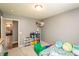 bedroom featuring colorful toys, gray walls and plenty of natural light at 1792 Persimmon Grove Dr, Indianapolis, IN 46234