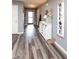 Welcoming entryway with stylish flooring, storage console, and modern decor at 1792 Persimmon Grove Dr, Indianapolis, IN 46234