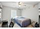 The bedroom features a ceiling fan, window with blinds, and a small bed at 19433 Tradewinds Dr, Noblesville, IN 46062