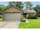 Charming single-story home with a brick facade and well-maintained landscaping at 19433 Tradewinds Dr, Noblesville, IN 46062
