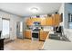Well-lit kitchen with stainless steel appliances and light wood cabinets at 19433 Tradewinds Dr, Noblesville, IN 46062