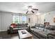 Spacious living room with bright windows and comfortable seating at 19433 Tradewinds Dr, Noblesville, IN 46062
