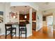 Kitchen bar with black granite counters and stainless steel appliances at 2105 N Meridian St # 203, Indianapolis, IN 46202