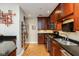 Well-equipped kitchen with granite countertops, stainless steel appliances and ample cabinet space at 2105 N Meridian St # 203, Indianapolis, IN 46202