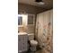 Bathroom with a floral curtain and vanity cabinet at 219 N 9Th Ave, Beech Grove, IN 46107