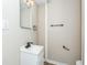 Updated half bathroom with modern fixtures and bright lighting at 2359 N Gale St, Indianapolis, IN 46218