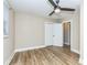 Bedroom with a ceiling fan, closet and wood-look floors at 2359 N Gale St, Indianapolis, IN 46218