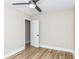 Bedroom with open closet and wood-look flooring at 2359 N Gale St, Indianapolis, IN 46218
