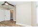 Bright bedroom features wood-look floors, large closet and ceiling fan with lights at 2359 N Gale St, Indianapolis, IN 46218