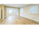 Living room featuring bright, natural light and durable wood-look floors at 2359 N Gale St, Indianapolis, IN 46218
