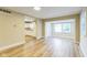 Bright living room features light wood floors and an open concept layout at 2359 N Gale St, Indianapolis, IN 46218
