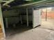 Unfinished basement offering storage shelving and brick foundation at 251 North St, Danville, IN 46122