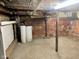 Spacious unfinished basement showcasing brick walls and exposed utilities at 251 North St, Danville, IN 46122