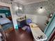 Charming bathroom featuring a clawfoot tub, stained-glass window, and modern fixtures at 251 North St, Danville, IN 46122