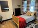Comfortable bedroom features natural light and view of the outdoors at 251 North St, Danville, IN 46122