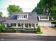 Charming two-story home with inviting front porch and meticulously landscaped yard at 251 North St, Danville, IN 46122