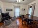The Game room has a ceiling fan, hardwood floors, and a window for natural light at 251 North St, Danville, IN 46122