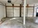 Spacious two-car garage with ample room for parking and storage at 251 North St, Danville, IN 46122