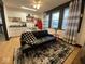 Cozy living room featuring a modern sofa, stylish rug, and ample natural light at 251 North St, Danville, IN 46122