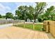 Large wooden deck overlooking a well maintained yard, providing a great outdoor entertaining space at 2801 E Southport Rd, Indianapolis, IN 46227